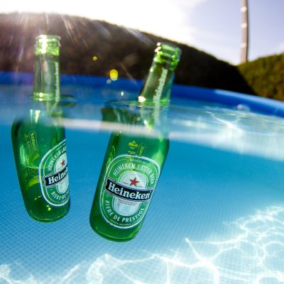 Heineken lager beer in pool