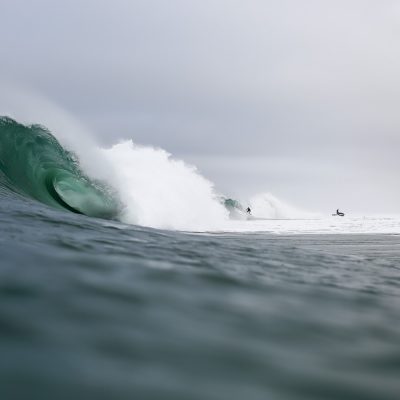 French surfer Nicolas Brieda getting out of a long tube ride with his team mate the photographer Bastien Bonnarme in Hossegor at the Quiksilver Pro France 2016 contest site this morning at the culs nus beach